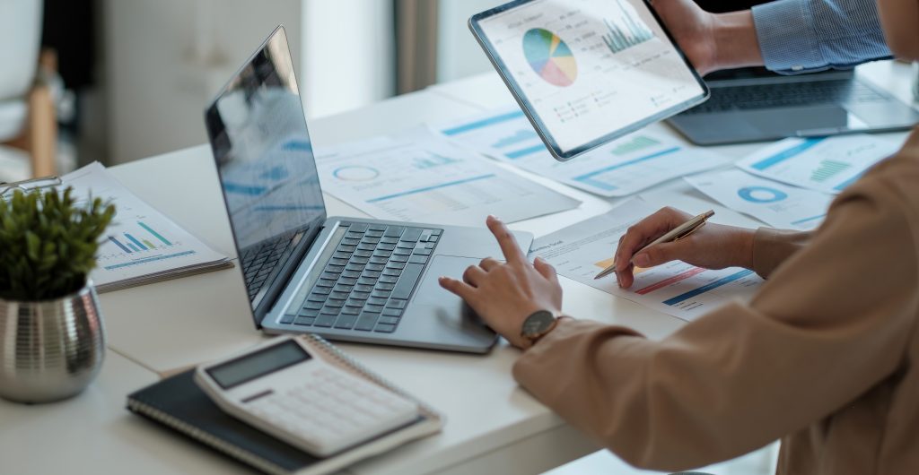 Business people are meeting for analysis data figures to plan business strategies. Business discussing concept,